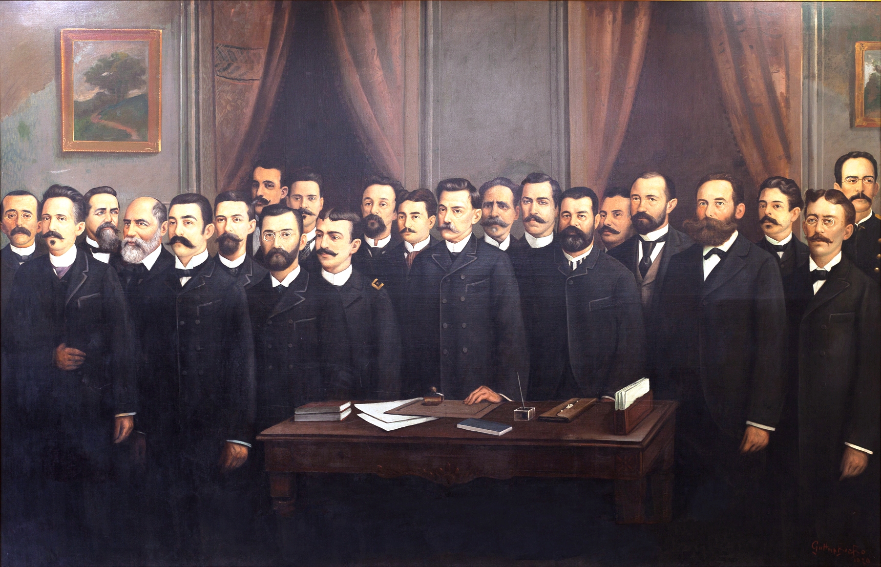 Reprodução do quadro com os 22 deputados da Constituinte de 1891, promulgada em 11 de junho de 1891. O quadro é do artista fluminense Galdino Guttmann Bicho (1888-1955). Consta que ele o pintou durante sua passagem por Florianópolis, em 1919, a pedido do então presidente do Legislativo, deputado Raulino Horn.